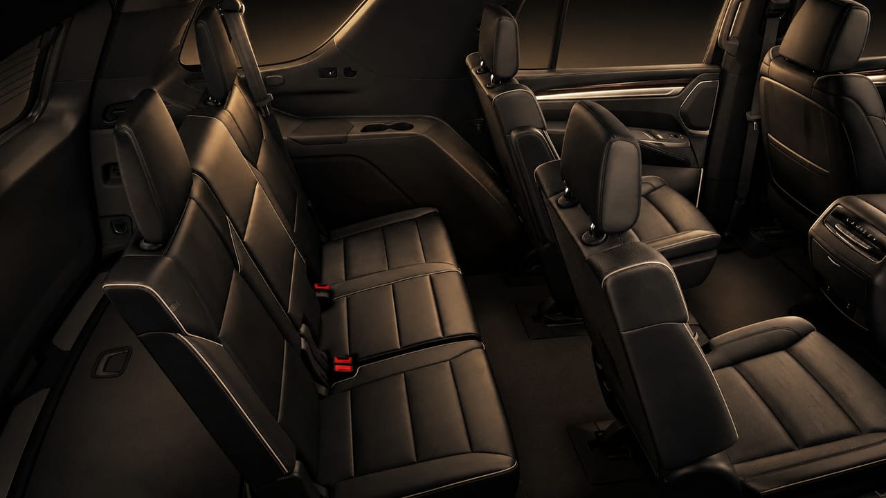 Spacious second-row leather seats in a high-end SUV — RideYeah passenger cabin
